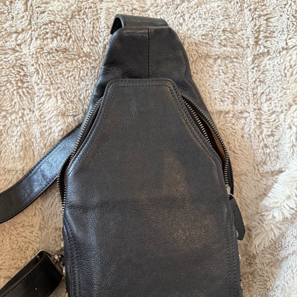 Black pebbled leather sling bag silver studs
